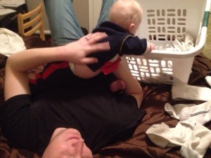 Kyle and William "helping" with the laundry :]